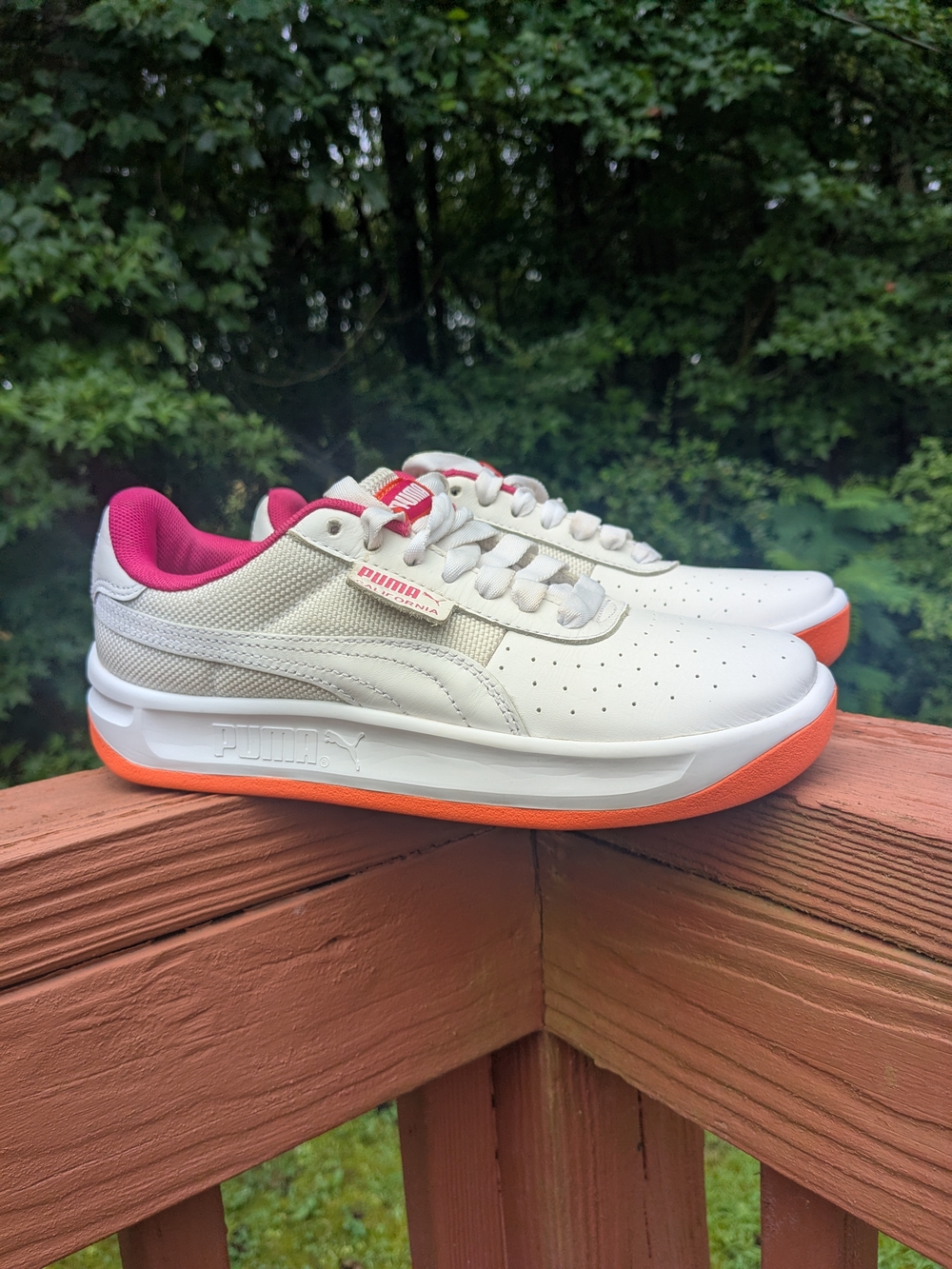 Puma Women’s White Sneakers with Pink Lining and Orange Soles